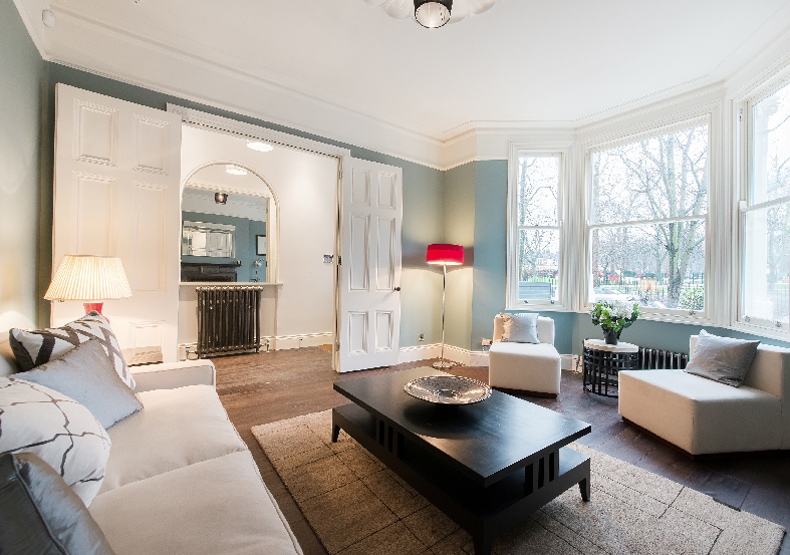A classic contemporary reception room home staged by Cullum Design | London UK
